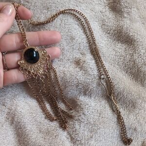 Elegant Gold and Black Pendant Necklace